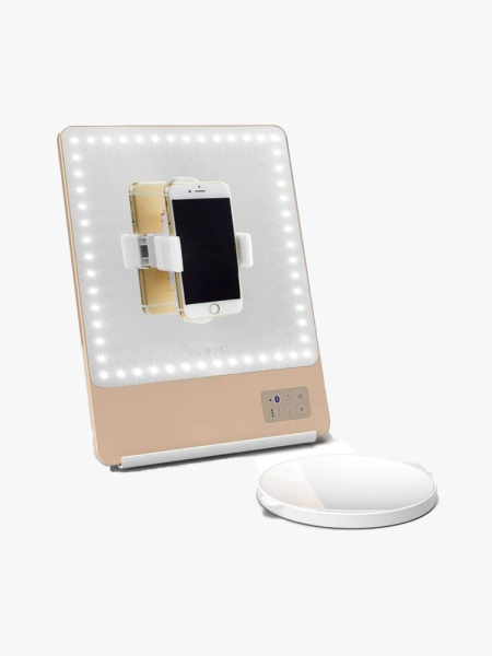 Riki Loves Riki 5X Skinny Lighted Mirror makeup mirror with iPhone clip on light gray background